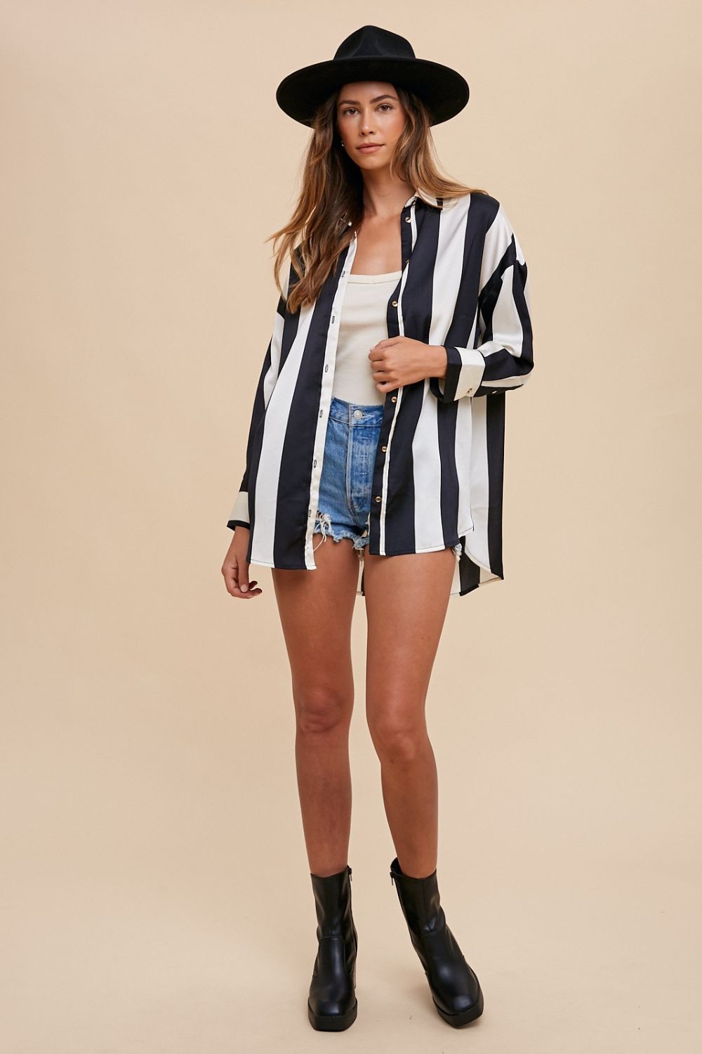 The Jetsetter’s Luxe Striped Button-Up – Bold & Chic Travel Essential