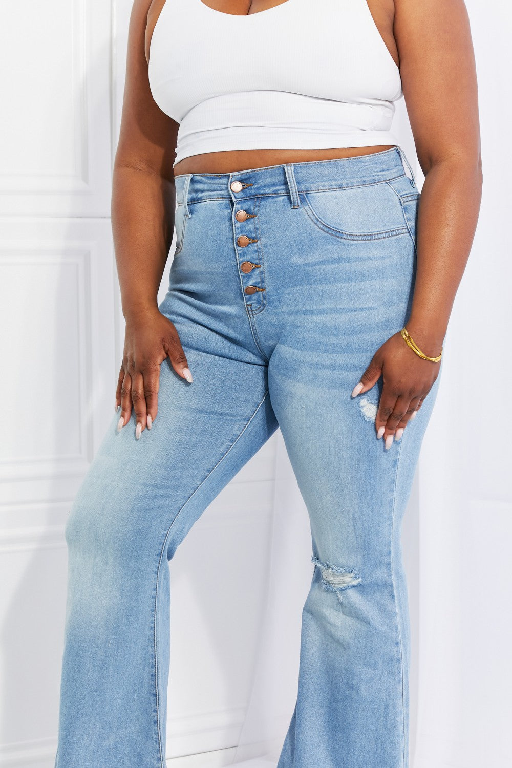 High-Rise Button-Up Flare Jeans with Distressed Detail