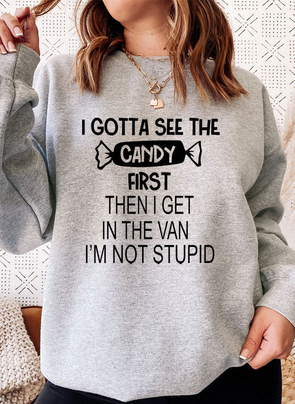 “I Gotta See the Candy First” Sweatshirt (Funny Halloween Quote | Multiple Colors)
