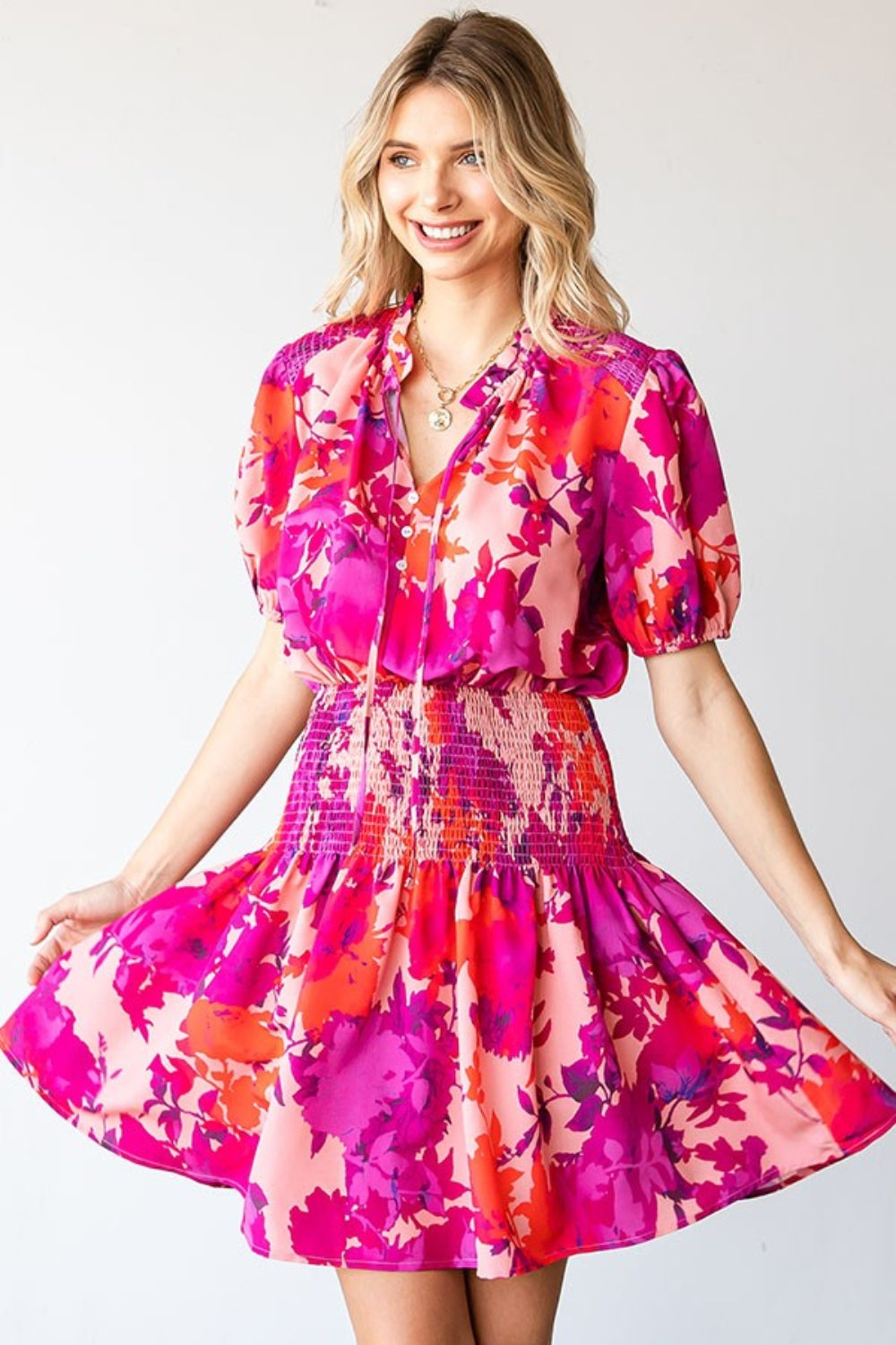 Bold Floral Smocked Mini Dress