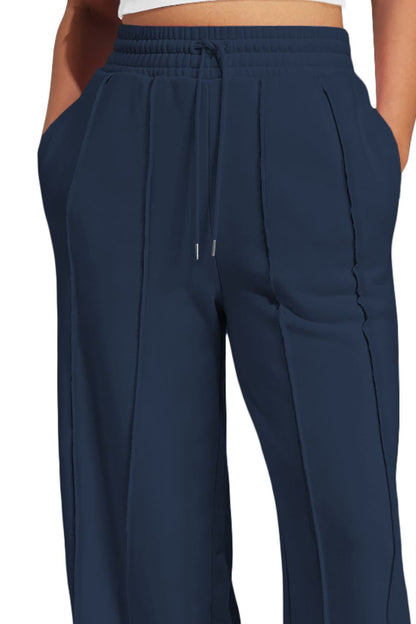 Pleated Wide-Leg Jogger Pants