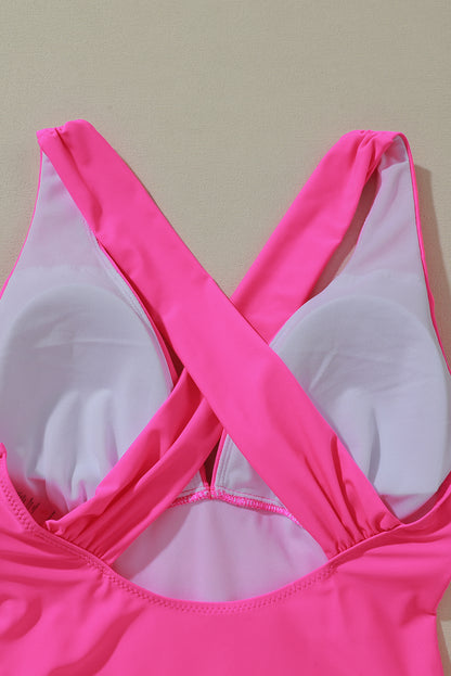 Vibrant Pink One-Piece Swimsuit with Plunge Neckline